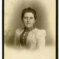 Cabinet photo of a middle-aged woman posed in photographer