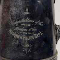          detail of engraved inscription on the side
   