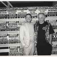 B+W photo of artist Robert Burcy (left) with Robert Foster with exhibit panel, HHM, Hoboken, early May, 2006.