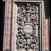 Color slide of close-up view of decorative tile on a building at an unidentified location