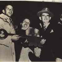 B+W copy photo of Mayor Fred DeSapio presenting Frank Sinatra with Key to the City at Hoboken City Hall, Hoboken, Oct. 30, 1947.