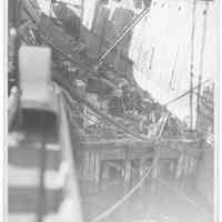 B+W photo of a of work pier; unknown ships in slip, Hoboken, no date, ca. 1940.