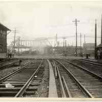 B+W photo looking east on 17th St. across Willow Ave. from far west of 17th St.; streetcar tracks & freight rail crossing, Hoboken, n.d., (1927).