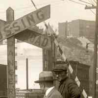          detail upper right: railroad crossing signs
   