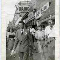 B+W inscribed photo of Frank Sinatra on Bergenline Ave.(?), W.N.Y., NJ., n.d., ca. 1940-1942.