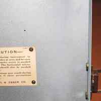          inside case door; printed label
   