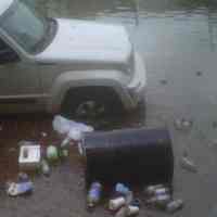 Color photos, 15, of boat rescues, flooding & debris after Hurricane Sandy, Hoboken, ca. Oct. 30-31, 2012.