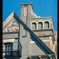          Color slide of detail view of cornice, pediment, chimney, brackets, dentils and fire escape at 77 Hudson Street on the NE corner of Hudson Place picture number 1
   