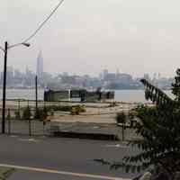 Color photo of view east of former piers near Fifth Street & Hudson River, Hoboken, July 1985. Color photo of waterfront looking south from near Seventh St., Hoboken, July 1985.