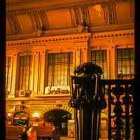 Color slide of interior eye-level view of Erie Railroad model train above the north door of the Lackawanna Terminal waiting room