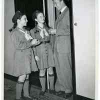 Sinatra photo: Frank Sinatra being interviewed by 2 Girl Scouts and giving an autograph, N.Y., n.d., ca. Oct. 2, 1944.