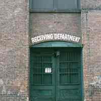 Color photo of the sign, Receiving Entrance, at 722 Grand St., Hoboken, Jan. 3 & 4, 2002.