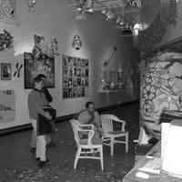 B+W photos, 12, of visitors to exhibition, Macy