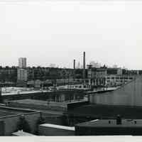 B+W photo of view probably taken from 14th Street viaduct looking southeast of factories & beyond, Hoboken, n.d., ca. 1965-1969.