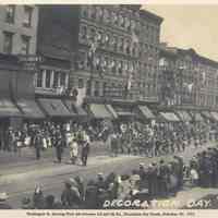 Photo of Washington St. looking north to Fourth St. with Girl Scouts marching in Decoration Day parade, Hoboken, 1922.