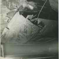 B+W photo of exterior view of damaged hull plates on unidentified vessel at the Bethlehem Steel Shipyard, Hoboken Division, no date, ca. 19