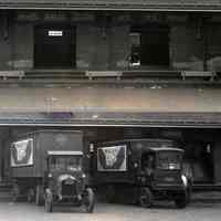          two details of trucks and loading dock signs
   