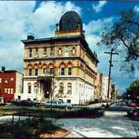 Color photo of the exterior of the Hoboken Public Library taken from Church Square Park, Hoboken, no date, ca. 1975.