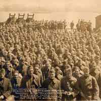 Sepia-tone group photo of returning Army troops on board U.S.S. Von Steuben at the Port of Debarkation, Hoboken, April 19, 1919.