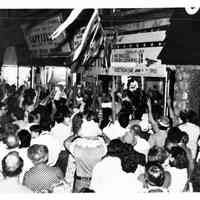 B+W photo of Tom Vezzetti supporters outside his campaign headquarters, 536 Washington St., on election night, Hoboken, [June 11, 1985].