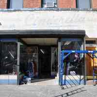          1 general view of Cinderella sign; Stan's Sporting Goods
   