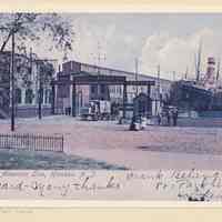Printed view of a color postcard of the Holland-America Line Fifth Street Pier, Hoboken, ca. 1905.