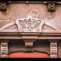 Color slide of close-up view of portico pediment at 1136 Garden between 11th and 12th