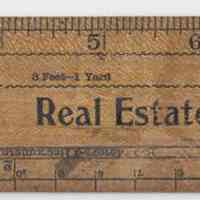 Advertising ruler printed "Albert S. Schiller Real Estate & Insurance, 84 Washington Street." No date, ca. 1900.