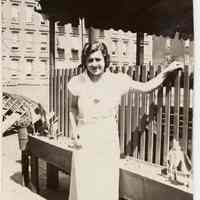 B+W photo of Mildred Marion "Molly" Pescatore on the roof near a covered deck at 325 Madison St., Hoboken, no date, ca. 1935-38.