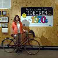 Digital images, 2, of Eileen Lynch at exhibit, Hoboken in the 1970s, at HHM, Hoboken, June 30, 2007.