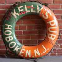 Sign, painted ring life preserver, from Kelly