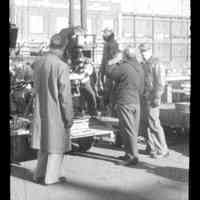 Color slide of a camera set-up with crew on pier set of the motion picture "On the Waterfront", Hoboken, no date, ca. late 1953-early 1954.