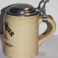          side view (note dents and paint on lid)
   