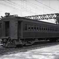 B+W photo negative of Delaware, Lackawanna & Western R.R. passenger car, MU 2216, in train yard, Hoboken, n.d., ca. early 1930s.