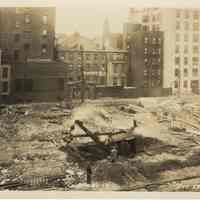 Sepia-tone photo of foundation preparation on the site for the Fabian Theatre, southeast corner of Newark & Washington Sts., Hoboken, Dec. 3, 1927.