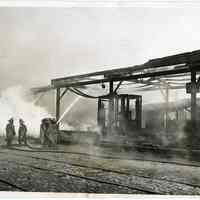 B+W photo of firemen at destroyed warehouse near Holland America Line, 5th & 6th Sts., Hoboken, Nov. 6, 1931.