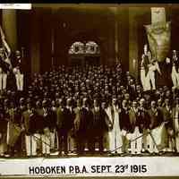 Sepia-tone group photo of members of the Hoboken Patrolmen
