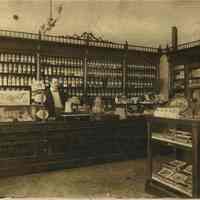          photo 2: interior; Louis Kinon behind counter
   