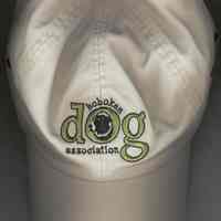 Baseball-style cloth cap with embroidered logo of the Hoboken Dog Association, Hoboken, no date, ca. 2000-2004.