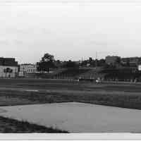 B+W photos, 2, of High School athletic field near Columbus Park; park playground, Hoboken, n.d., ca. 1965-1969.