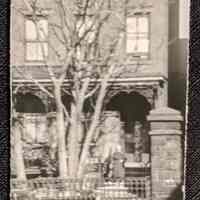 Photo of a woman standing in front of 64 10th Street Hoboken.