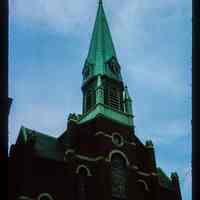 Color slide of eye-level view of façade of St. Matthew Trinity Lutheran church on the SW corner of Hudson and 8th