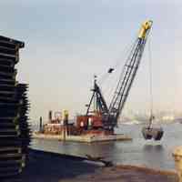 Color photo of dredging barge in Hudson River, attributed to Hoboken, no date, ca. 1970s.