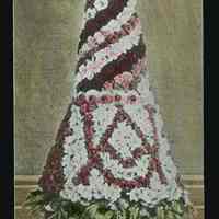 Lantern slide, color, of a fancy floral decoration, used for promotional display in Hoboken, no date, ca. 1920.