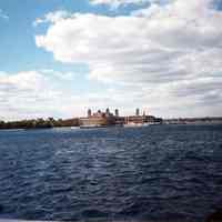 Color photo of Ellis Island taken from a ferry during the NJ Transit Train Festival, Hoboken 1989.