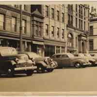 Washington St. looking north to Newark St., showing 74-76-78, 80 and 82-84 Washington St. & Hoboken City Hall, Hoboken, 1942.