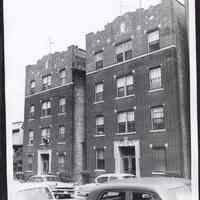 B&W photo of apartment buildings at 128-130 Ege Avenue, Jersey City.