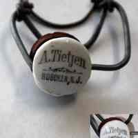 Stopper, bottle, ceramic: A. Tietjen, Hoboken, N.J. N.d., ca. 1894-1910.