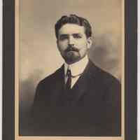 Sepia-tone photo of unidentified young man posed in studio, Hoboken, n.d., ca. 1895-1900.