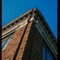 Color slide of detail view of cornice, brackets, frieze and pilasters at 86 River Street on the SW corner with Newark